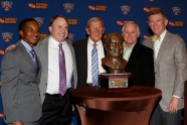 Eddie Robinson III, TCU Coach Gary Patterson, former Notre Dame Coach Lou Holtz, 2014 FWAA President Kirk Bohls and Sugar Bowl President Judge Dennis Waldron pose with the FWAA Eddie Robinson Coach of the Year Trophy. Patterson received the award on Jan. 10, 2015, in Dallas.
