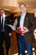 Ted Miller of ESPN.com accepted a commemorative football and certificate for first place in the column category of the FWAA's 2015 Best Writing Contest. Photo by Melissa Macatee.